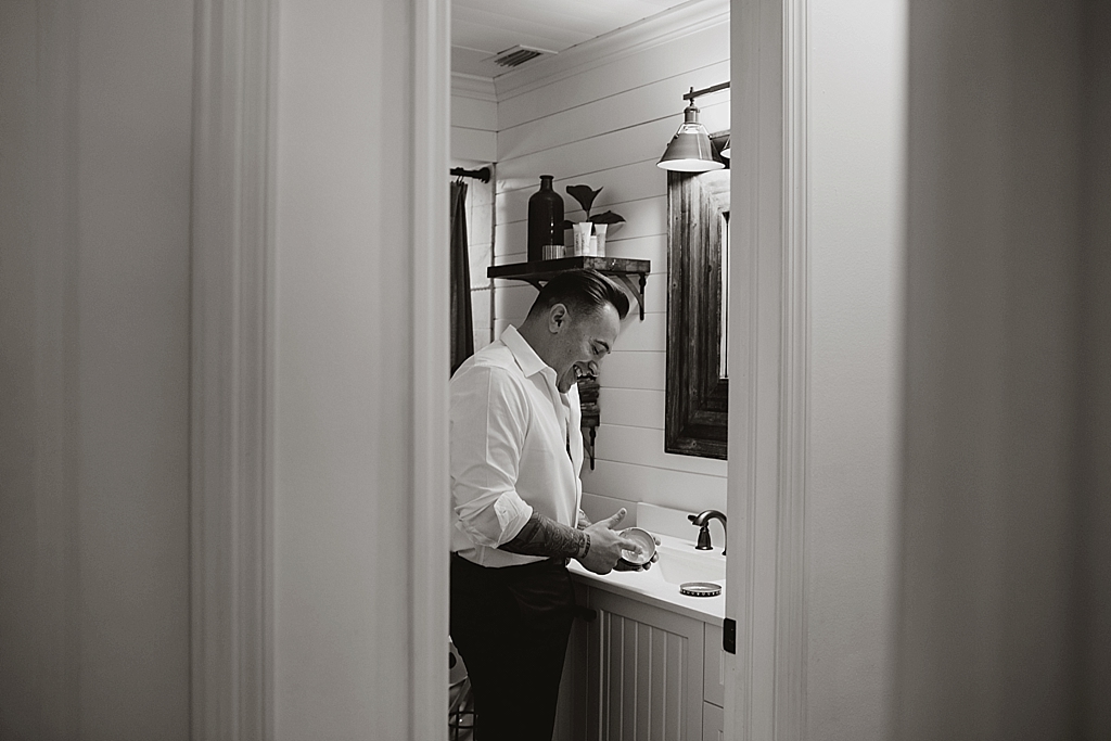 Groom getting ready for his elopement