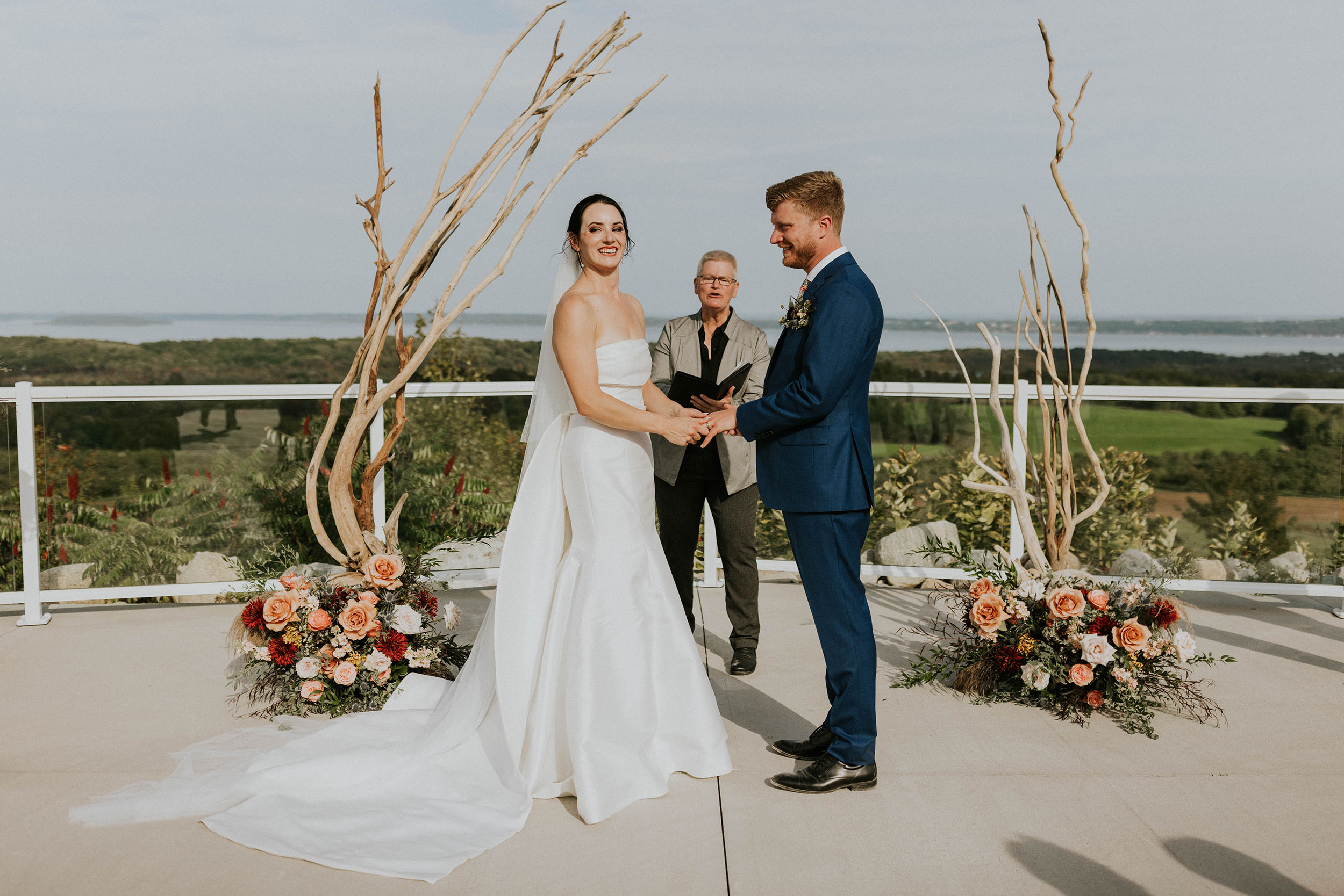 A colorful fall wedding ceremony at Bayview Weddings at Gallagher Farms.