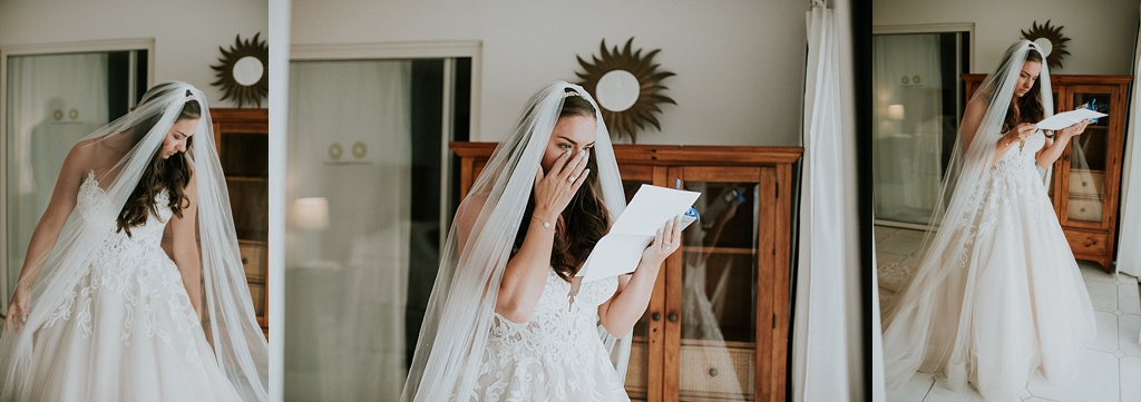 Bride reading a sweet note from her groom
