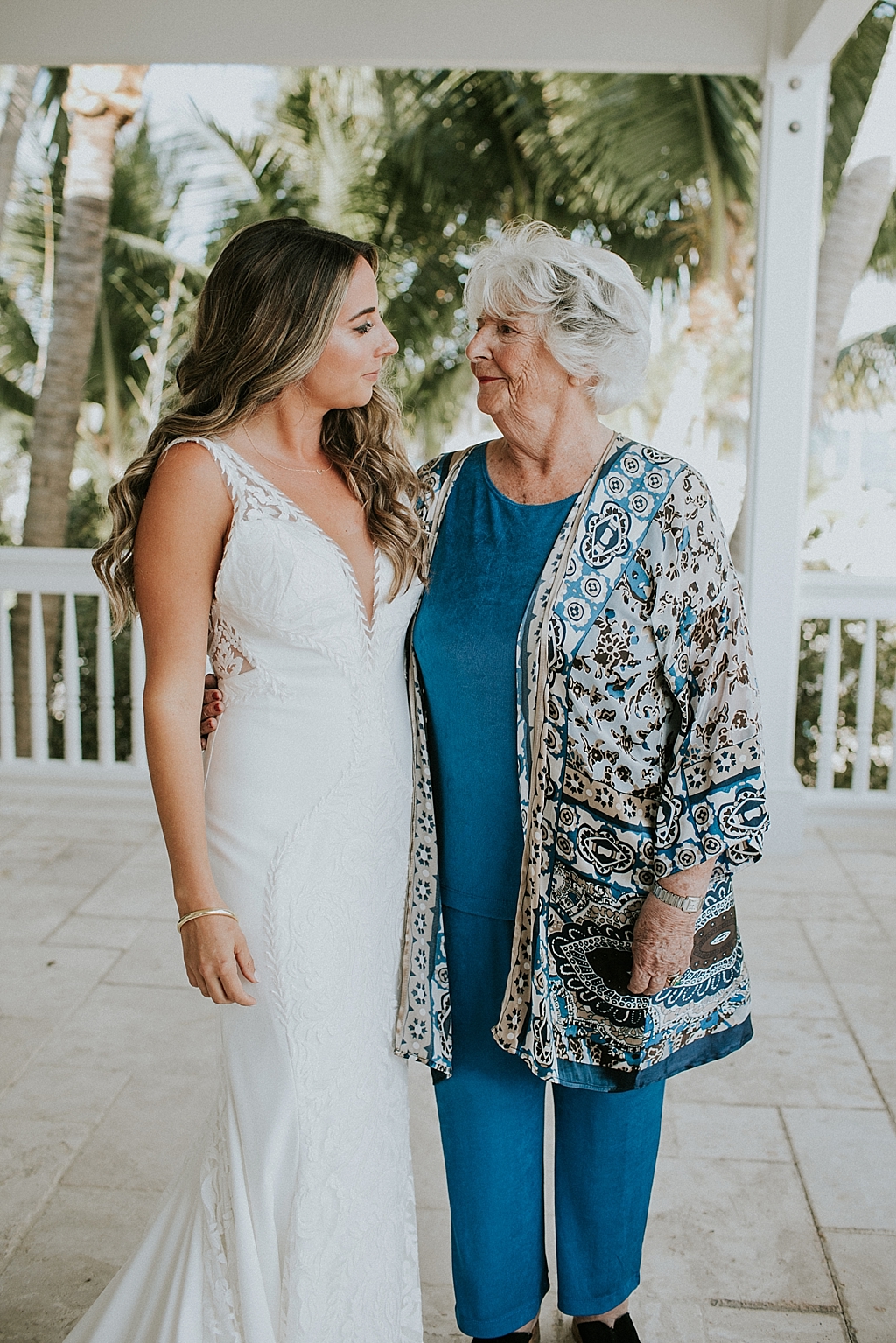 bride has a quiet moment with her grandmother before her wedding
